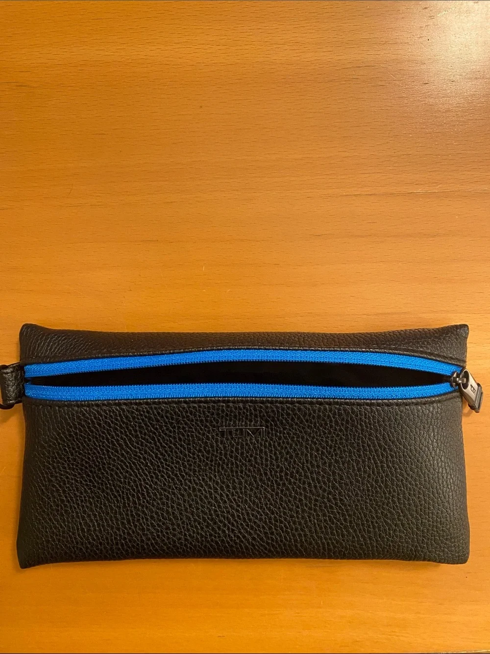 TUMI Woman’s Cosmetic Black and Blue Bag